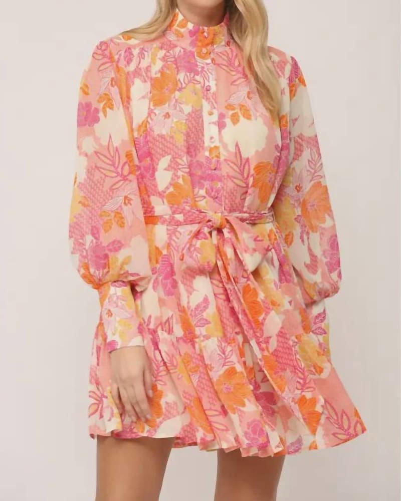 Side of a model wearing a size Large Coral Crush Dress in Pink And Orange in Pink And Orange by Fate. | dia_product_style_image_id:335016